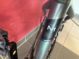 a close up of a bike with a chain attached to it