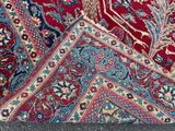 an image of a close up of a red and blue rug