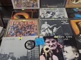 a lot of records on a table in a store
