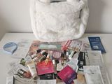 a white purse sitting on top of a white table