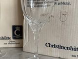two empty wine glasses sitting on a table