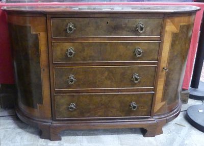 a wooden dresser with a marble top on display