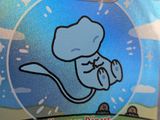 a sticker of a cartoon mouse on the back of a bag