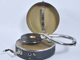 a silver and black pot with a handle and a silver lid