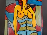 Un tableau représentant une femme en robe rayée est accroché au mur.