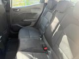 the back seats of a car with a seat belt in a car