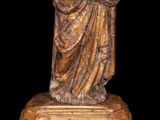 an image of a statue of a man holding a child