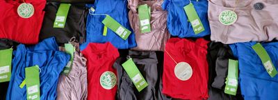 many pairs of pants that are on display in the store