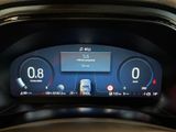 the dashboard of a car with a digital display on it