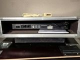 an image of a television set in a case on top of a table