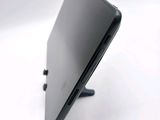 a close up view of a laptop on a stand