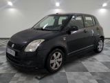 a picture of a small black car on a checkered floor
