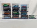 several toy cars are stacked on top of each other in clear boxes