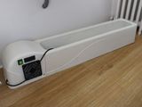 une photo d'une pièce équipée d'un chauffage et d'un radiateur