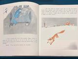 an open book with a picture of a cat and a dog