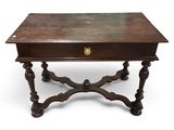 an old wooden table with a drawer on top of it