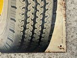 a close up of a tire on a piece of paper