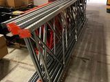 a large metal structure in the middle of a warehouse