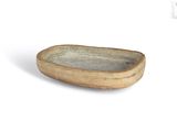 a small bowl that is sitting on a white surface