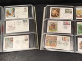 several different types of stamps are in a folder on a table