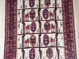 an oriental rug on a tile floor with a wooden floor