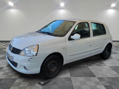 a picture of a white car parked in a garage
