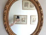 a person taking a picture of themselves in a mirror