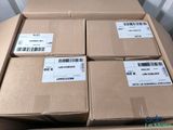 several boxes are stacked on top of each other on a table