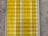 two rows of yellow tickets sitting on the ground