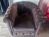a chair that is sitting on the floor in a room