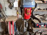 a machine that is sitting on a table in a garage