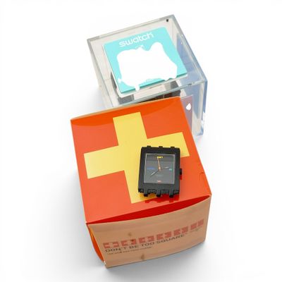 a box with a watch inside of it and a box with a watch inside of it