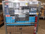 a large metal cart with a lot of boxes in it