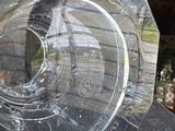 a clear glass vase sitting on top of a table