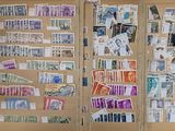a suitcase with a lot of stamps on it