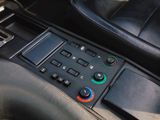 a close up of a control panel in a car