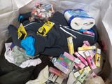 a bag full of items that are inside of a trash can