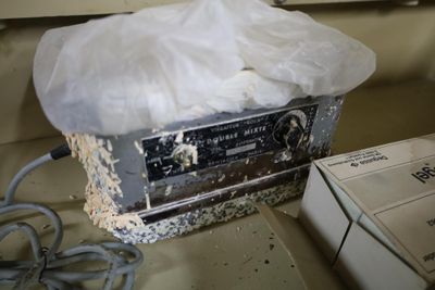 a box with a tissue on top of it on a counter
