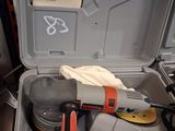 a tool in the case that is sitting on the floor