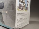 a box with a camera inside of it on a table