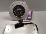 a camera that is sitting on top of a metal plate