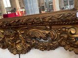 a large mirror on the wall in the room