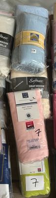 many different types of bedding on the shelf