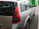 a silver car parked on the side of the road