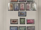 an image of a picture of a collection of stamps on a wall