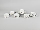 six tasses à café et soucoupes ornées d'oiseaux
