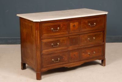a marble top chest of drawers on a wooden stand