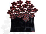 a vase with a bunch of red flowers in it