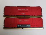 two red ram modules sitting on top of each other on a white surface