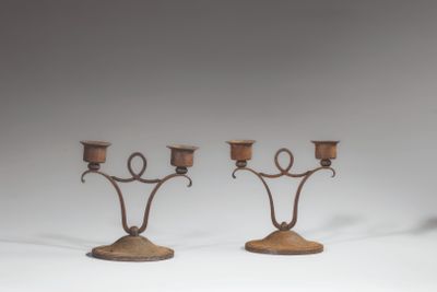 pair of antique iron candelabs with candle holders